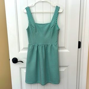 Sea foam green and pin strip black dress